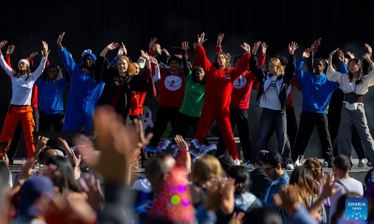 People dance during Celebration Scare, a family-friendly Halloween bash held in Mississauga, Ontario, Canada, on Oct. 19, 2024.  (Photo: Xinhua)