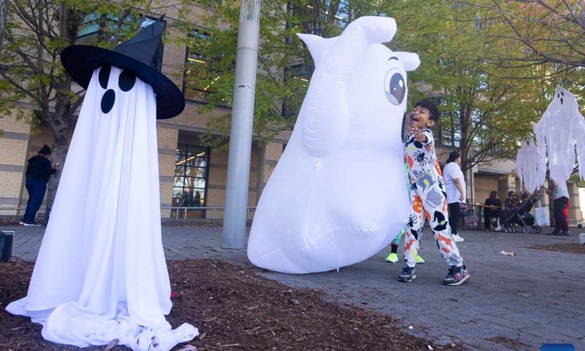 A boy plays during Celebration Scare, a family-friendly Halloween bash held in Mississauga, Ontario, Canada, on Oct. 19, 2024.  (Photo: Xinhua)