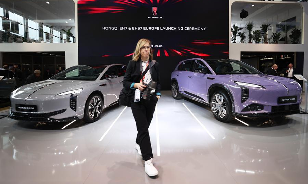 A woman visits the pavilion of Chinese carmaker FAW-Hongqi at the 2024 Paris Motor Show during the media day in Paris, France, Oct. 14, 2024.  (Photo: Xinhua)