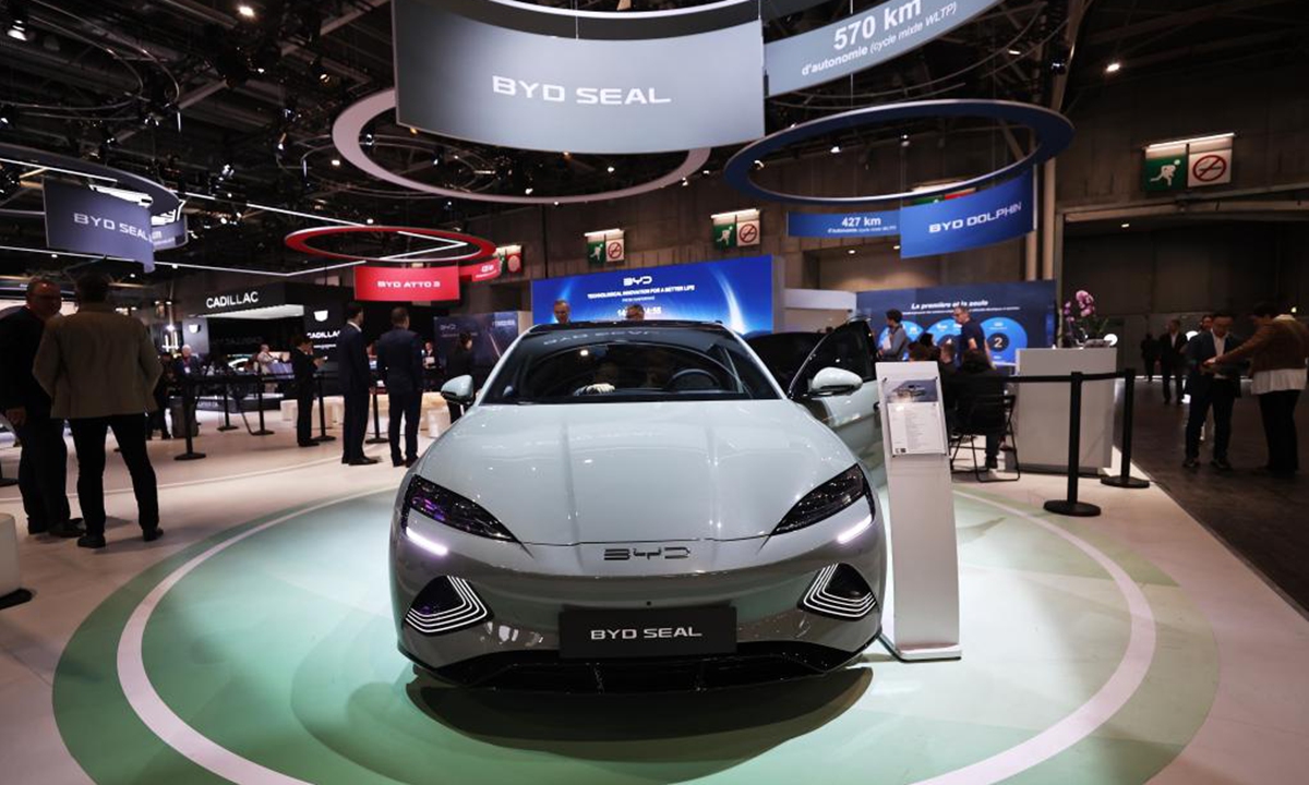 People visit the pavilion of Chinese carmaker BYD at the 2024 Paris Motor Show during the media day in Paris, France, Oct. 14, 2024.  (Photo: Xinhua)