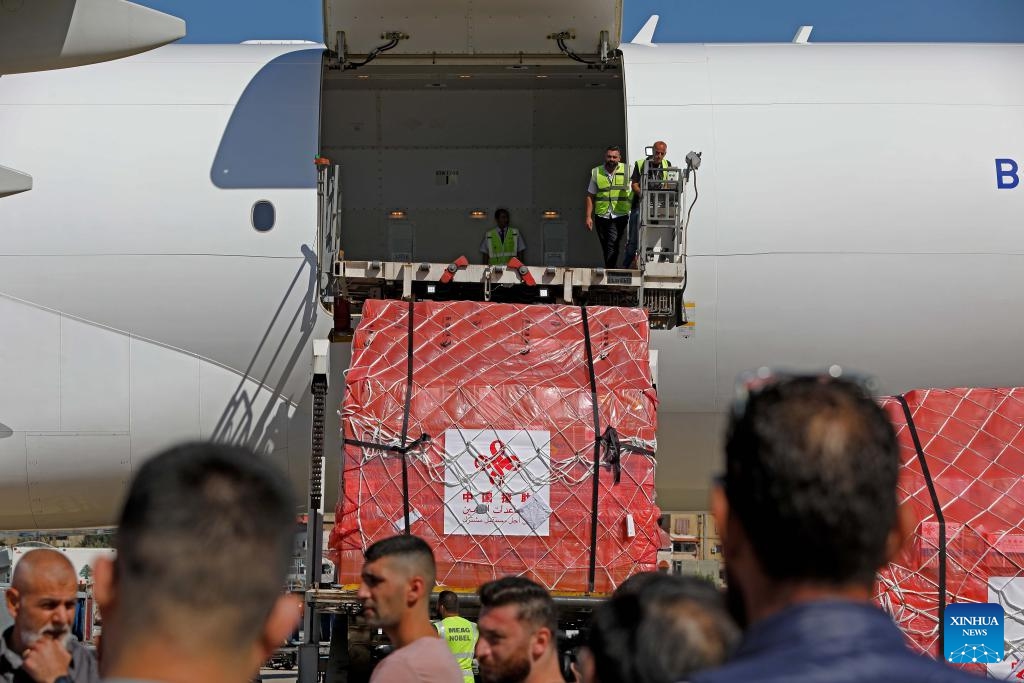 Staff members unload emergency medical aid from China at the Rafik Hariri International Airport in Beirut, Lebanon, Oct. 21, 2024. China delivered a batch of emergency medical aid to Lebanon on Monday, as the latter grapples with casualties from ongoing cross-border conflicts with Israel. (Photo: Xinhua)