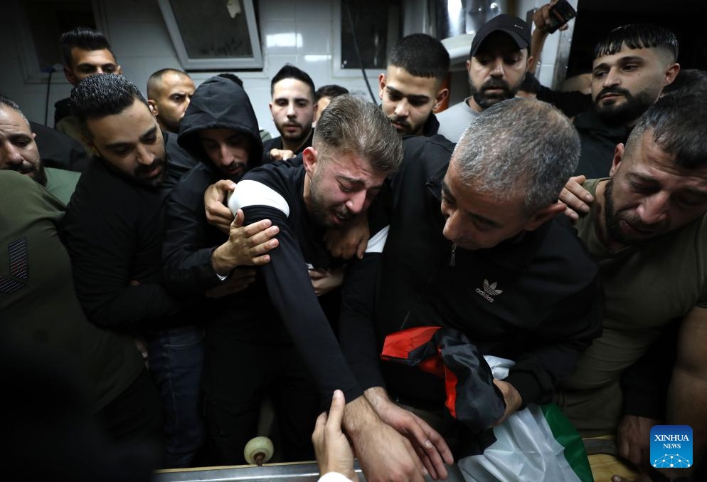 People mourn Palestinian boy Abdullah Hawash during his funeral in the West Bank city of Nablus, on Oct. 22, 2024. The Palestinian child was killed by Israeli forces in the city of Nablus in northern West Bank, Palestinian sources said Tuesday. (Photo: Xinhua)