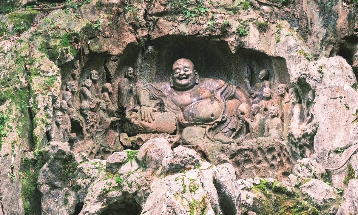 A statue of the Maitreya Buddha, or <em>Mile Fo</em> at the Feilai Peak, next to the Lingyin Temple in Hangzhou, East China's Zhejiang Province Photo: VCG