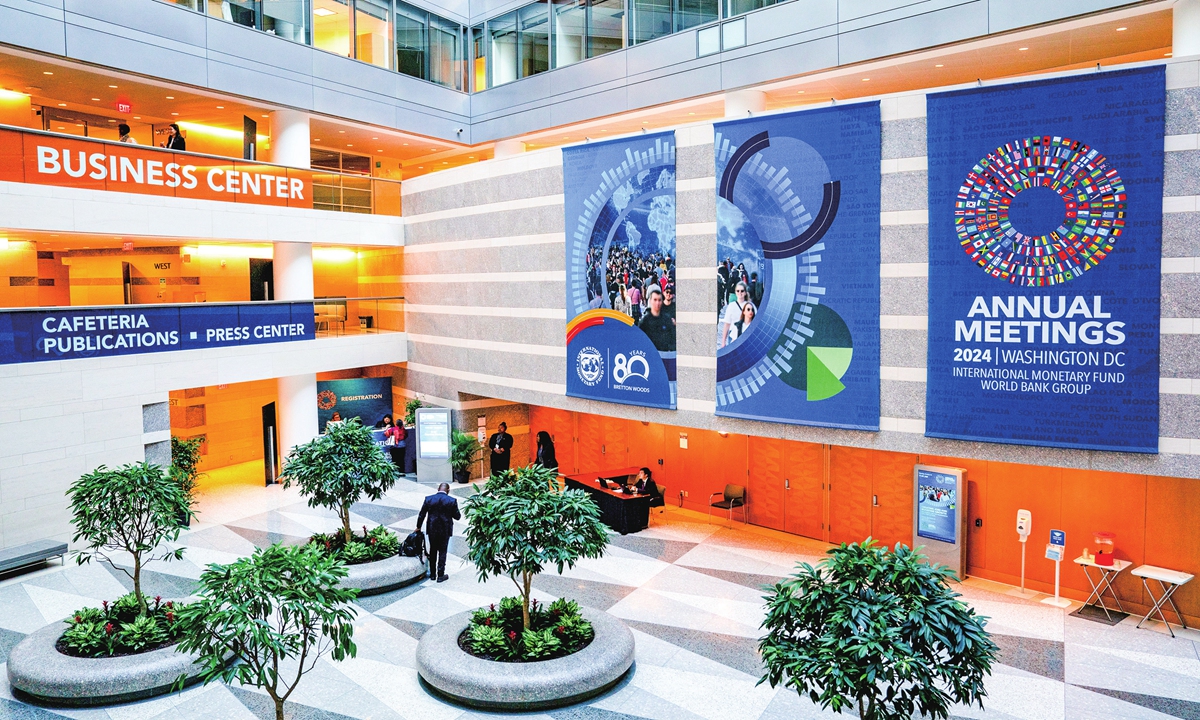 Signs for the IMF and World Bank fall meetings are seen inside the IMF headquarters in Washington, DC, US. Photo: VCG