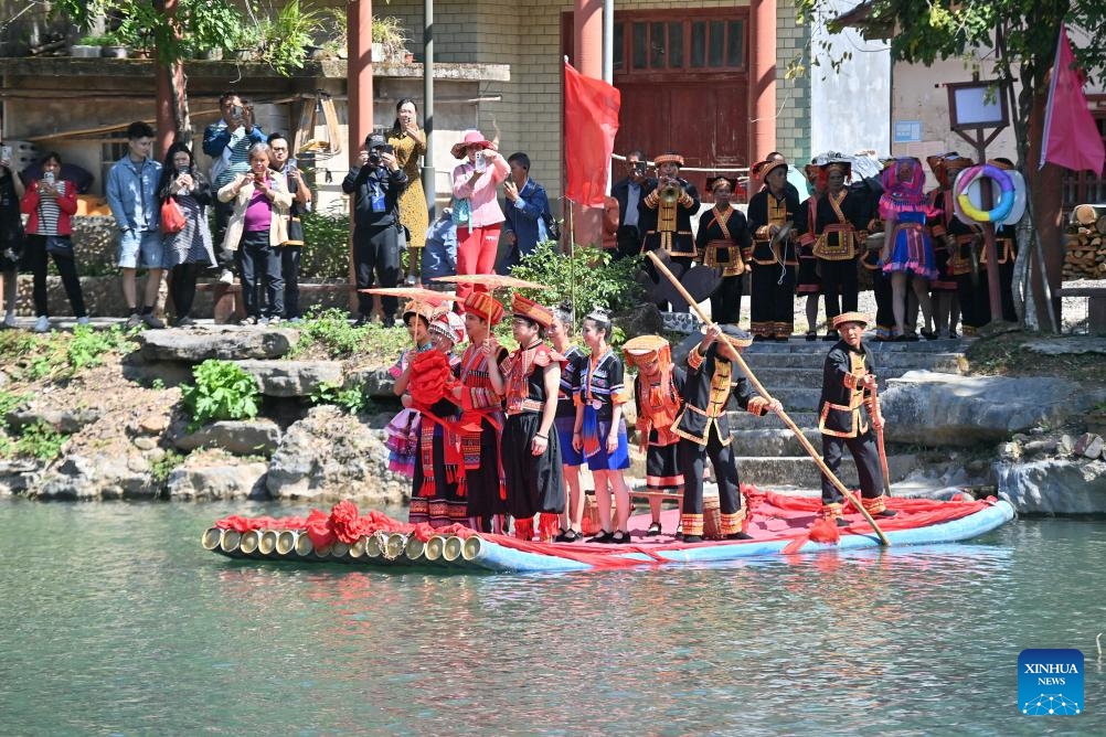 Actors perform a traditional Yao wedding ceremony in Changping Yao Township in Mengshan County, Wuzhou City, south China's Guangxi Zhuang Autonomous Region, Oct. 23, 2024. Various cultural activities have boosted the unity and common development of all ethnic groups in Mengshan. (Photo: Xinhua)