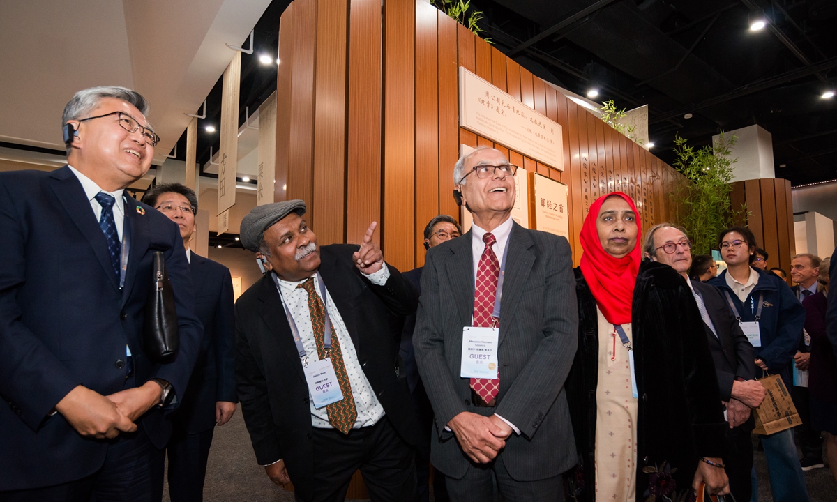 Foreign scientists visit an exhibition during the opening ceremony of the WSTDF 2o24 on October 22, 2024. Photo: Chen Tao/GT