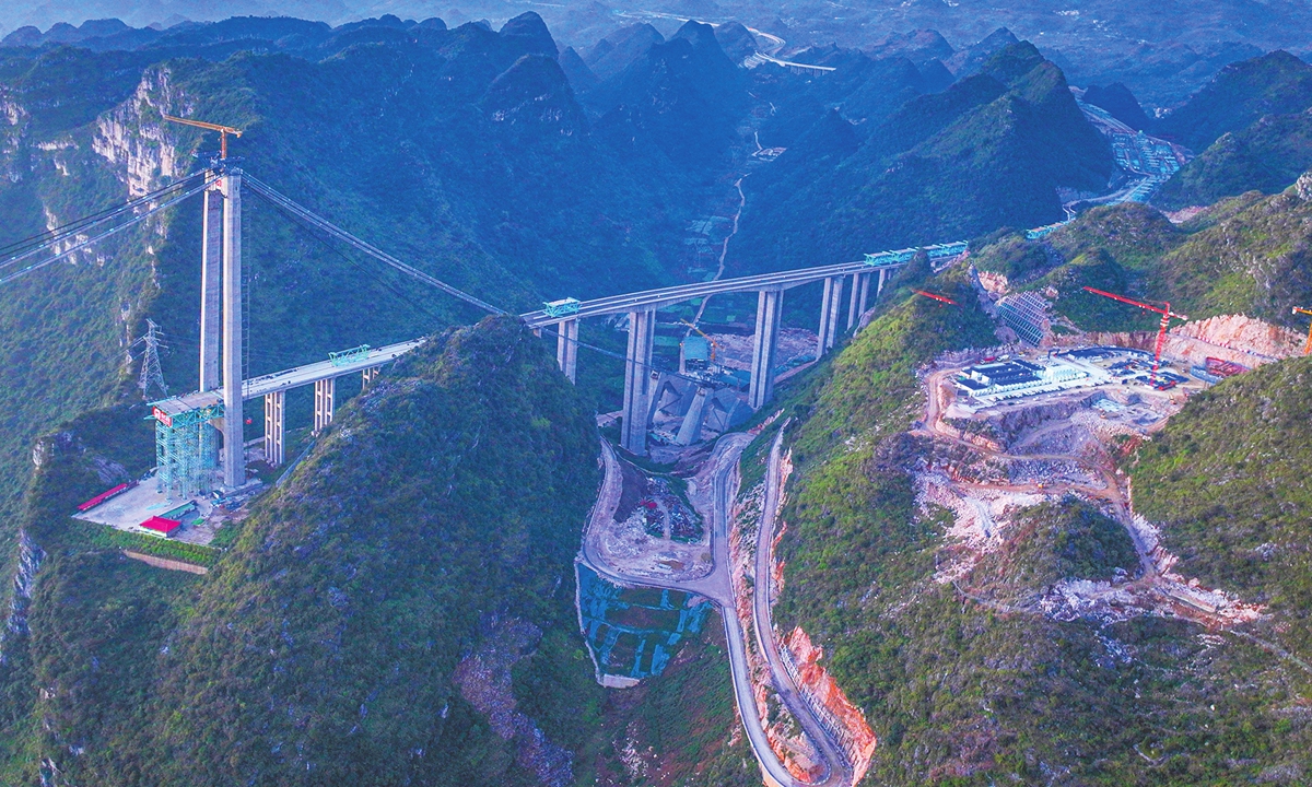 An aerial view of the Huajiang Grand Canyon Bridge in Southwest China's Guizhou Province on October 24, 2024. Construction of the bridge, with a designed height of 625 meters between the bridge deck and the Beipanjiang River below, began in 2022. It's set to be the highest in the world after it is completed in 2025, the Xinhua News Agency reported. Photo: VCG