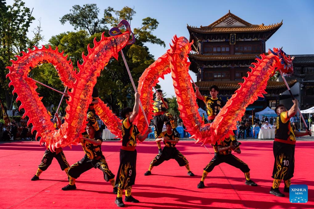 Members of Malaysia Johor Loong & Lion Dance Sport Association compete in the traditional Dragon Dance event at the festival in Kunming, capital of southwest China's Yunnan Province, on Oct. 19, 2024. (Photo: Xinhua)