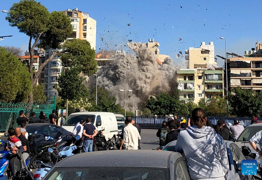 Smoke billows from a building after an Israeli airstrike in the southern suburb of Beirut, Lebanon, Oct. 22, 2024. The death toll from Israeli airstrikes on Lebanon since the beginning of the Israel-Hezbollah conflict has reached 2,530, with injuries up to 11,803, according to a report released Tuesday by the Disaster Risk Management Unit at the Lebanese Council of Ministers. (Photo: Xinhua)