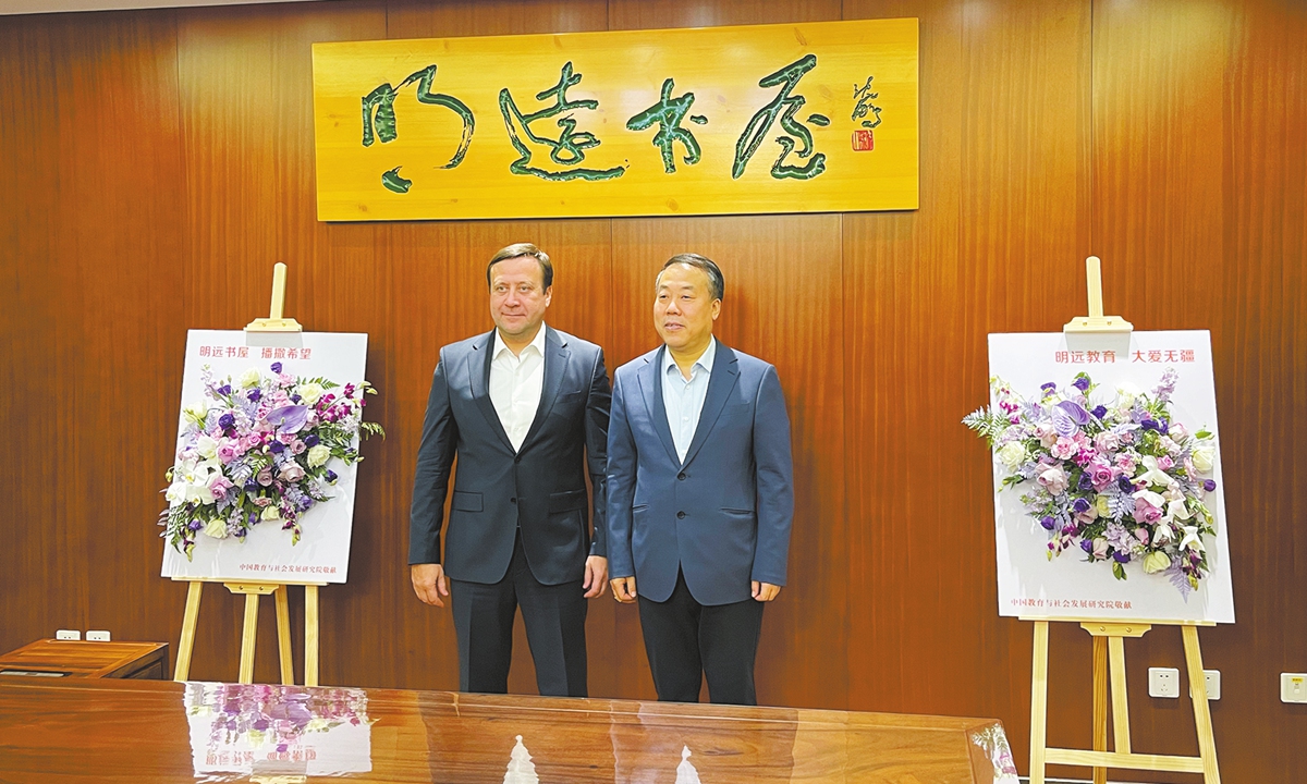 Pavel Shevtsov (left) and Liu Lin pose for a picture in Beijing, on October 21. Photo: Courtesy of the Russian Cultural Centre in Beijing