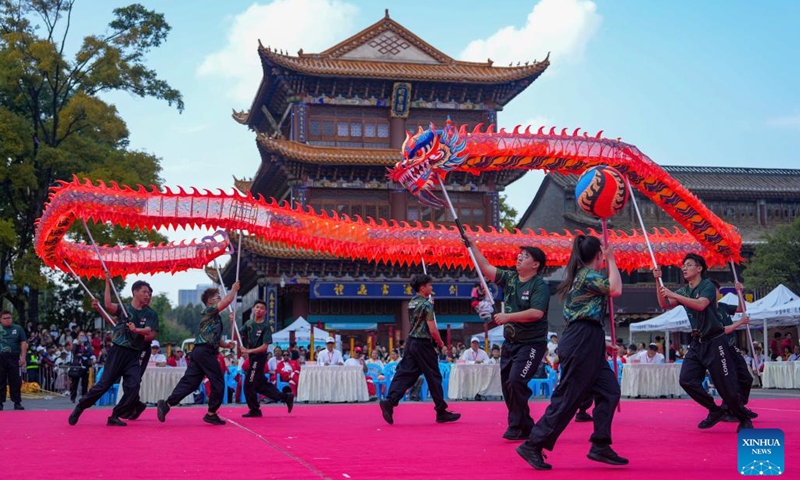 Members of Malaysia Johor Loong & Lion Dance Sport Association compete in the traditional Dragon Dance event at the festival in Kunming, capital of southwest China's Yunnan Province, on Oct. 19, 2024. (Photo: Xinhua)