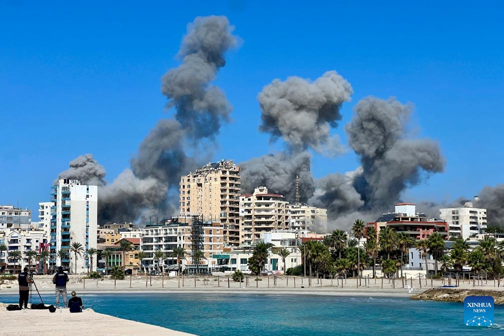 This photo taken on Oct. 23, 2024 shows the smoke caused by Israeli airstrikes in Tyre, Lebanon. Three people were killed by an Israeli raid on Maarakeh village in Tyre District, the official National News Agency (NNA) reported. (Photo: Xinhua)