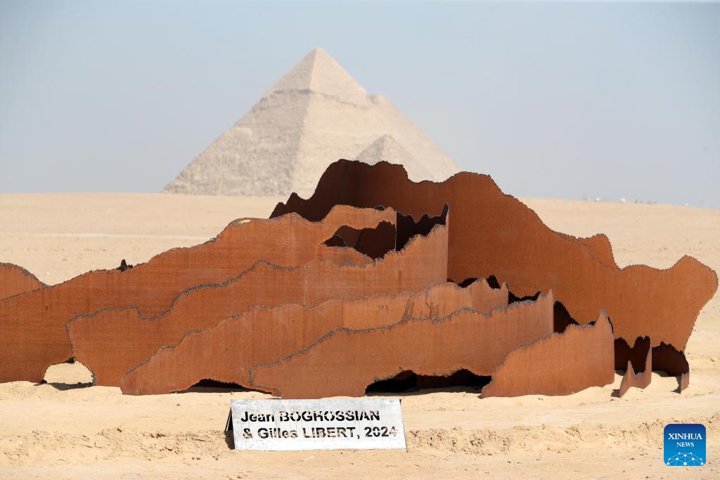 An artistic installation is displayed during the Forever Is Now international art exhibition at Giza Pyramids scenic spot in Giza, Egypt, Oct. 24, 2024. The fourth edition of Forever Is Now international art exhibition on Thursday kicked off in the area of Egypt's Giza Pyramids scenic spot, showcasing 12 artworks of artists from different countries. The exhibition runs from Oct. 24 to Nov. 16. (Photo: Xinhua)