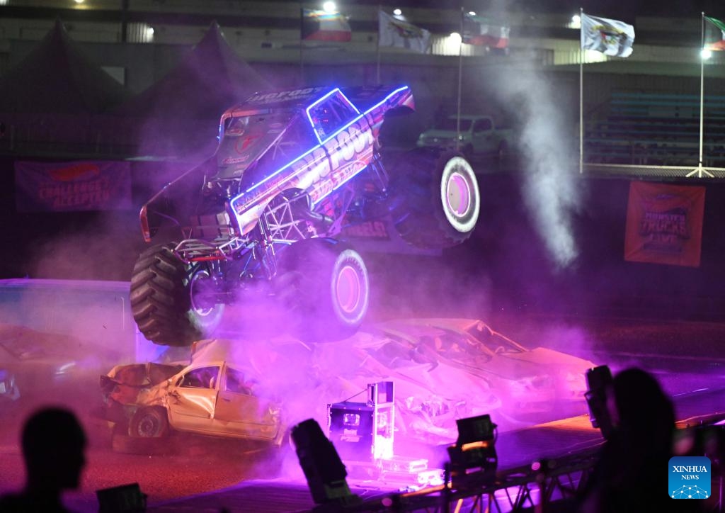 A Hot Wheels Monster Truck performs during a show in Mubarak Al-Kabeer Governorate, Kuwait, Oct. 23, 2024. The show named Hot Wheels Monster Trucks Live Glow Party kicked off on Wednesday at Kuwait's Mubarak Al-Kabeer Governorate, and will last from Oct. 23 to 26 for four different performances. (Photo: Xinhua)