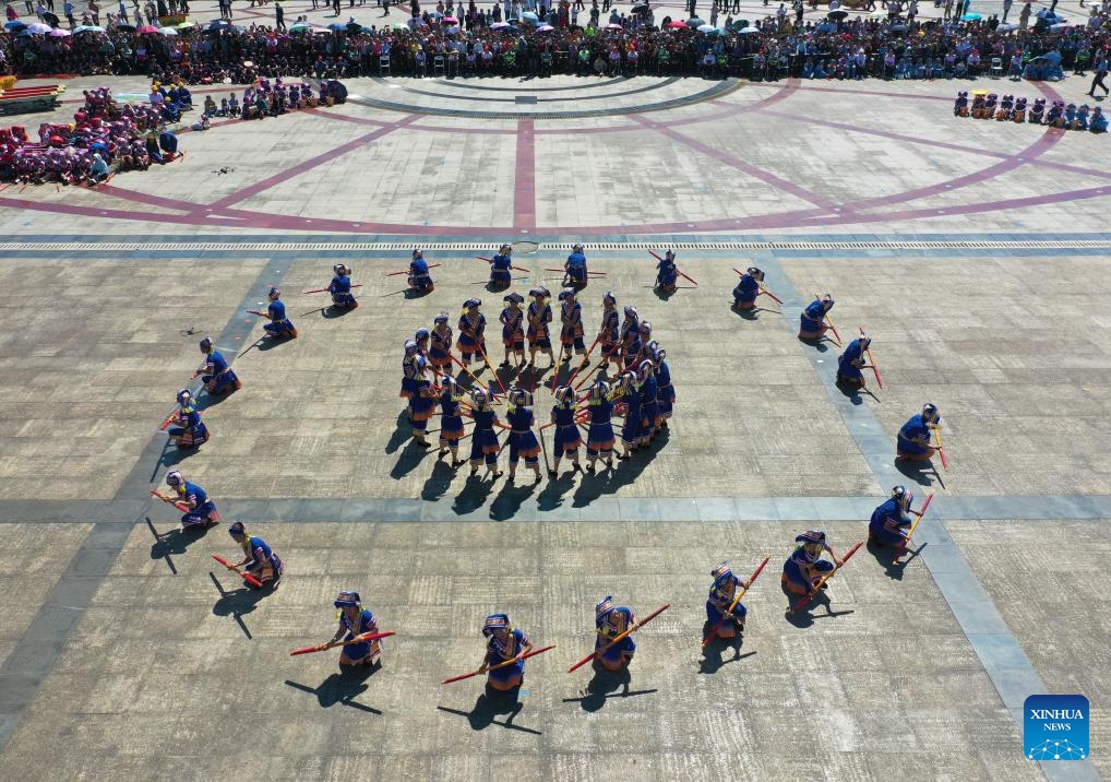 A drone photo shows actors performing at an event celebrating harvest in Tiandeng County, south China's Guangxi Zhuang Autonomous Region, Oct. 23, 2024. Many places in Guangxi ushered in the harvest season of late rice. (Photo: Xinhua)