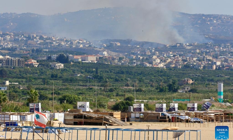 This photo taken on Oct. 23, 2024 shows the smoke caused by Israeli airstrikes in Tyre, Lebanon. Three people were killed by an Israeli raid on Maarakeh village in Tyre District, the official National News Agency (NNA) reported. (Photo: Xinhua)