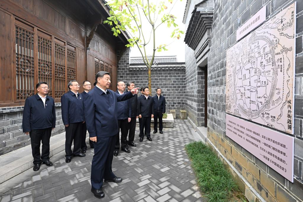 Chinese President Xi Jinping, also general secretary of the Communist Party of China Central Committee and chairman of the Central Military Commission, visits the Liuchi Alley, a historical cultural site in Tongcheng City, east China's Anhui Province, October 17, 2024. (Photo: Xinhua)