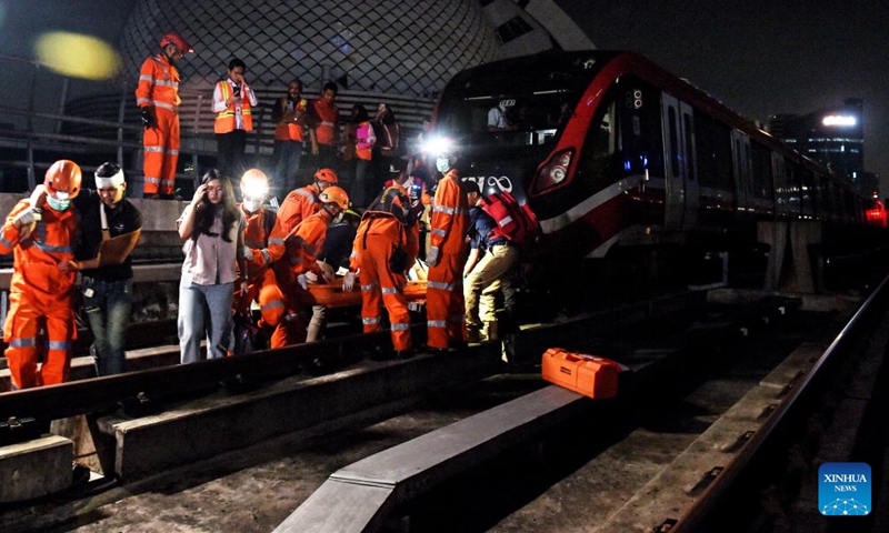 Rescuers participate in an emergency drill for passengers along the Light Rail Transit (LRT) Jabodebek (Jakarta-Bogor-Depok-Bekasi) in Jakarta, Indonesia, Oct. 26, 2024.(Photo: Xinhua)