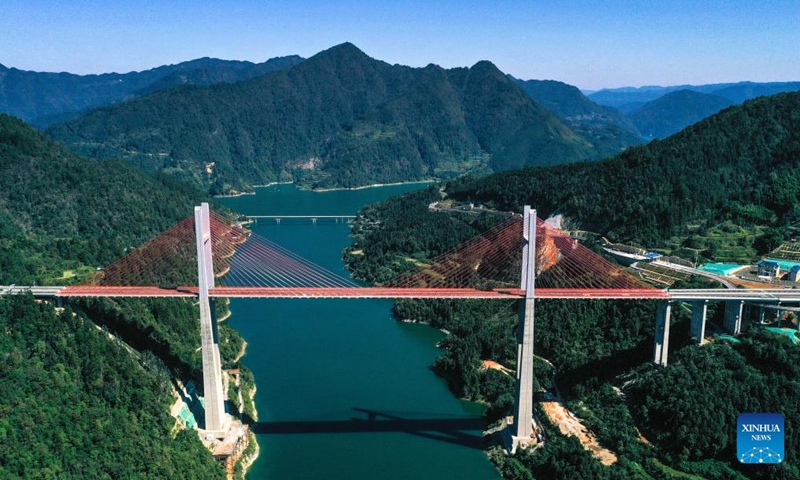 An aerial drone photo taken on Oct. 25, 2024 shows Nanmengxi bridge of the Jianhe-Liping expressway in southwest China's Guizhou Province. The Jianhe-Liping expressway was opened to traffic on Friday, shortening the travel time between Jianhe County and Liping County of Guizhou Province to about one hour. The main line of this expressway stretches 74.754 kilometers. (Photo: Xinhua)