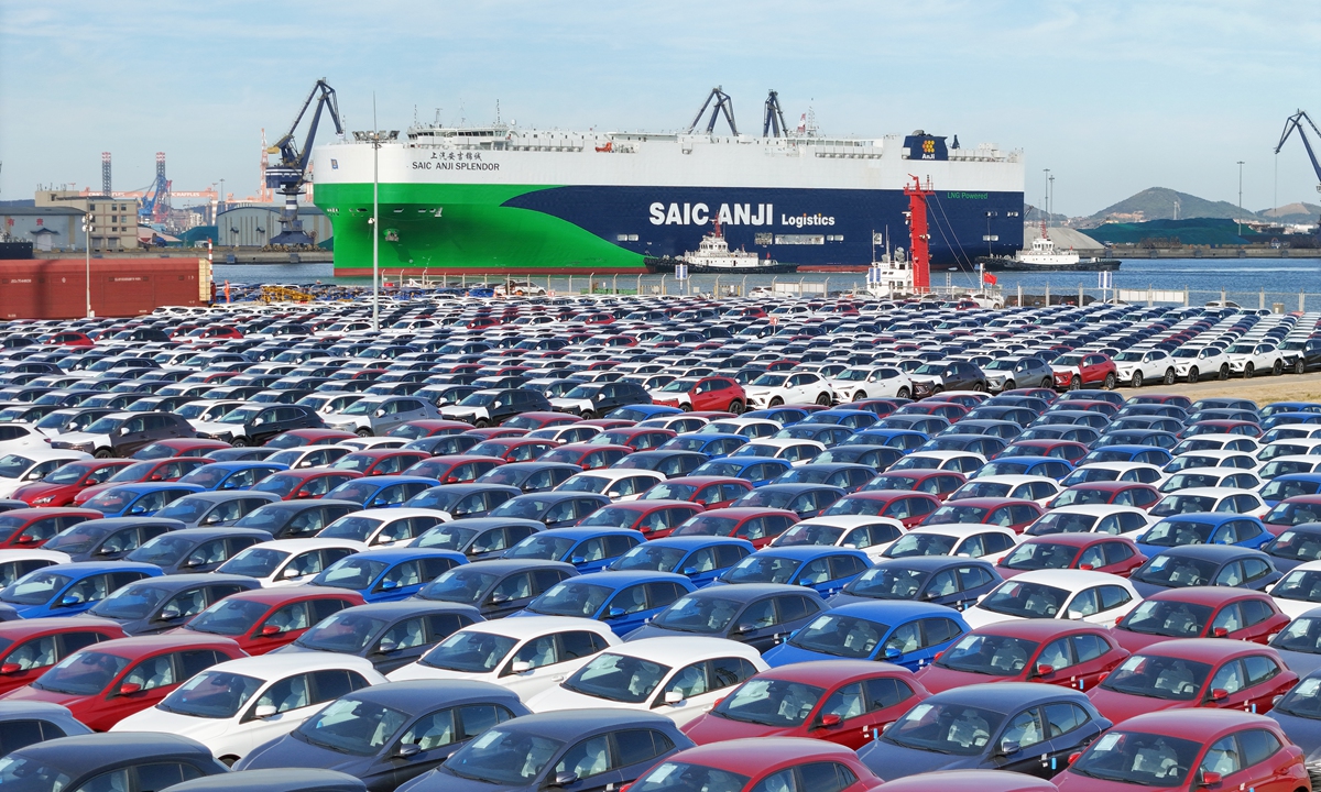 Thousands of cars wait to be loaded for shipment overseas at Yantai Port in East China's Shandong Province on October 28, 2024. In the first three quarters of 2024, a total of 4.312 million complete vehicles were exported, a year-on-year increase of 27.3 percent, reflecting the robust export trend of made-in-China vehicles. Photo: VCG