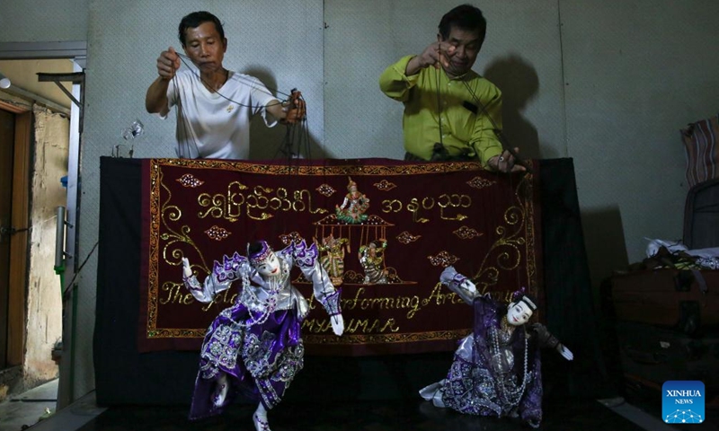 Puppeteers perform during a puppet show in Yangon, Myanmar, Oct. 27, 2024. (Photo: Xinhua)