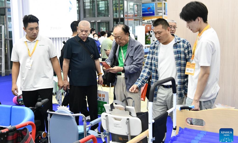 Senior citizens visit the 2024 Shenzhen International Intelligent Elderly Care Industry Expo in Shenzhen, south China's Guangdong Province, Oct. 27, 2024. A total of 203 exhibitors from home and abroad have brought more than 1,000 products and technologies for elderly care to the expo, which was held from Oct. 25 to 27 in Shenzhen. (Photo: Xinhua)