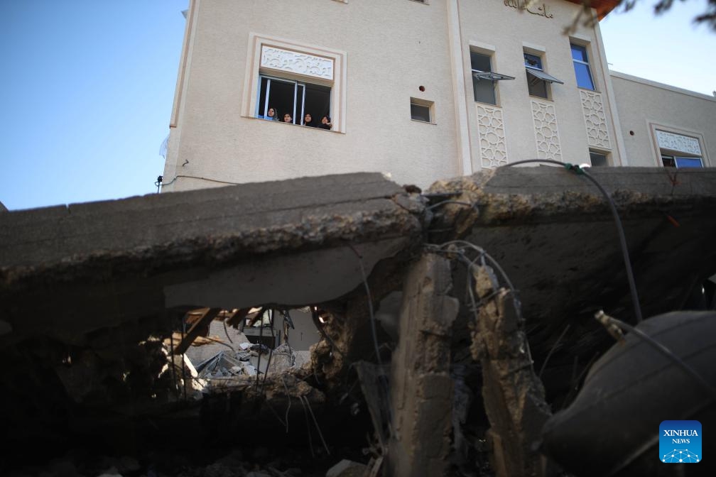 People look out from a window after an Israeli attack in al-Nuseirat refugee camp, central Gaza Strip, on Oct. 28, 2024. The Palestinian death toll from ongoing Israeli attacks on the Gaza Strip has surpassed 43,000, Gaza-based health authorities said in a statement on Monday. (Photo: Xinhua)