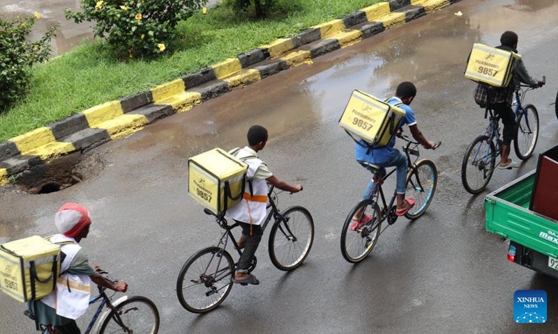 Backpack bikers of Pick Delivery ride on the street in Adama, the capital of Ethiopia's Oromia regional state, on Oct. 11, 2024. (Photo: Xinhua)