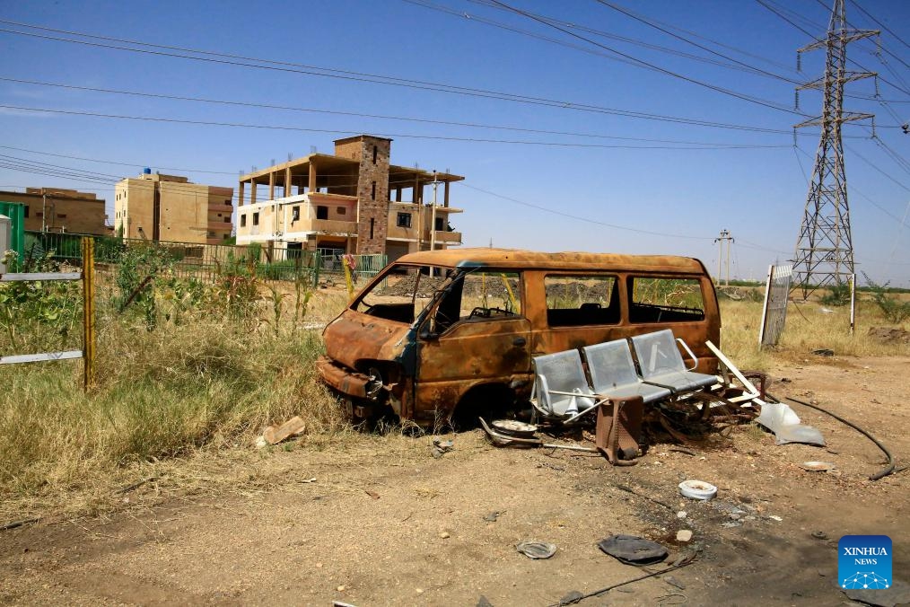 The photo, taken on October 28, 2024, shows a destroyed vehicle in the city of Bahri, north of Khartoum, Sudan. More than 14 million people have fled their homes since the start of the ongoing conflict in Sudan, the International Organization for Migration (IOM) said on Tuesday. (Photo: Xinhua)