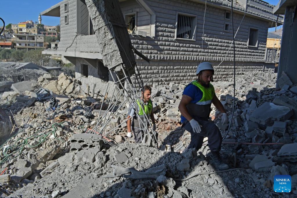 People check the damage caused by Israeli airstrikes in Baalbek, Lebanon, Oct. 29, 2024. At least 60 people, including two children, were killed and 58 others injured following Israeli air raids on the eastern Bekaa Valley, Lebanon's Health Ministry said Monday. (Photo: Xinhua)