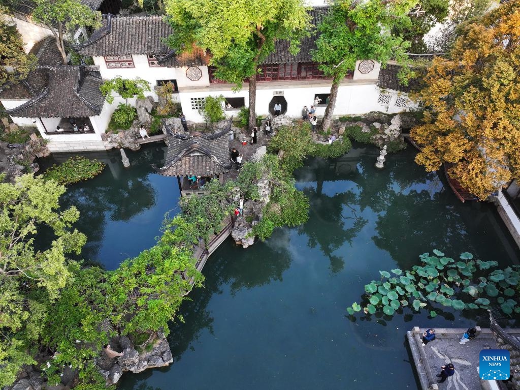 An aerial drone photo taken on Oct. 23, 2024 shows tourists visiting the Lingering Garden in Suzhou, east China's Jiangsu Province. About a 20-minute ride by high-speed train from east China's Shanghai, Suzhou is one of the richest cities in China, with its more than 100 classical gardens considered some of the most beautiful in the country, and nine of them serving as UNESCO world heritage sites. (Photo: Xinhua)