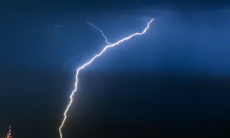 This photo taken on Oct. 30, 2024 shows a bolt of lightning over the skyline of Kuwait City, Kuwait. (Photo: Xinhua)