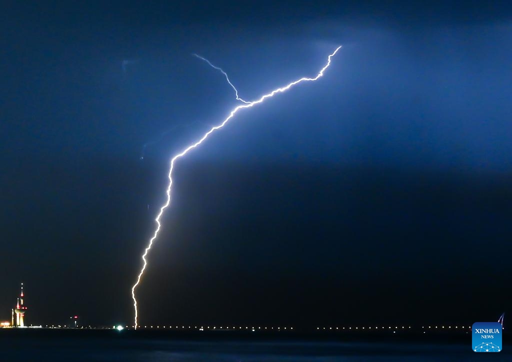 This photo taken on Oct. 30, 2024 shows a bolt of lightning over the skyline of Kuwait City, Kuwait. (Photo: Xinhua)