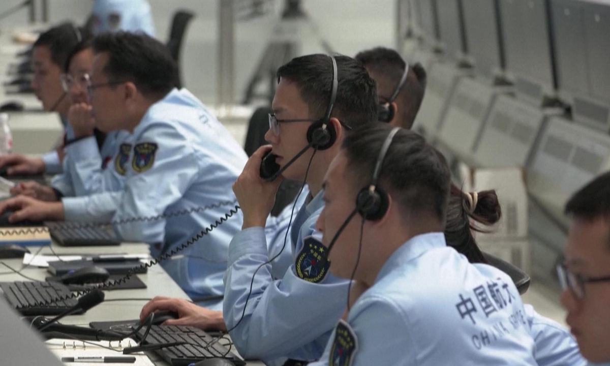 Picture taken on October 28, 2024, shows working staff are making preparedness for the launch of Shenzhou-19 manned spacecraft. Photo: VCG