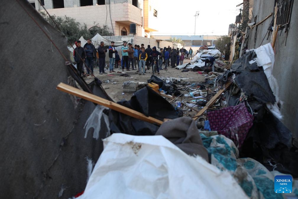 Palestinians check a destroyed tent after Israeli bombardment in the city of Deir al-Balah in central Gaza Strip, on Oct. 30, 2024. (Photo: Xinhua)