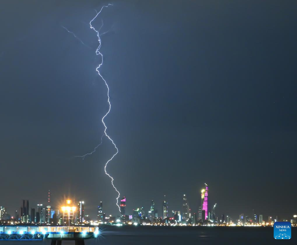 This photo taken on Oct. 30, 2024 shows a bolt of lightning over the skyline of Kuwait City, Kuwait. (Photo: Xinhua)