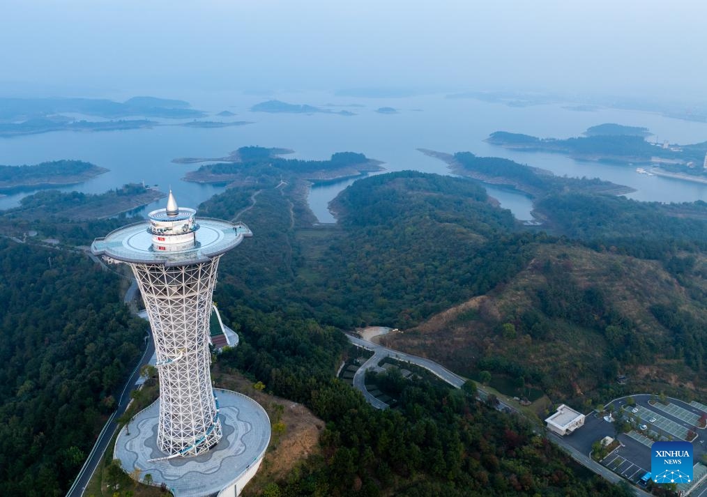 An aerial drone photo taken on Oct. 29, 2024 shows the Danjiangkou Reservoir in central China's Hubei Province. China's South-to-North Water Diversion Project has three routes. The middle route, the most prominent of the three as it feeds water to the nation's capital, starts at the Danjiangkou Reservoir and runs across the Henan and Hebei provinces before reaching Beijing and Tianjin. It began supplying water in December 2014. (Photo: Xinhua)