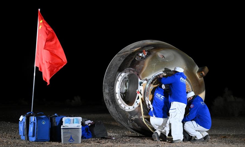 The return capsule of the Shenzhou-18 manned spaceship, carrying taikonauts Ye Guangfu, Li Cong and Li Guangsu, touches down at the Dongfeng landing site in North China's Inner Mongolia Autonomous Region, on November 4, 2024. Photo: Xinhua