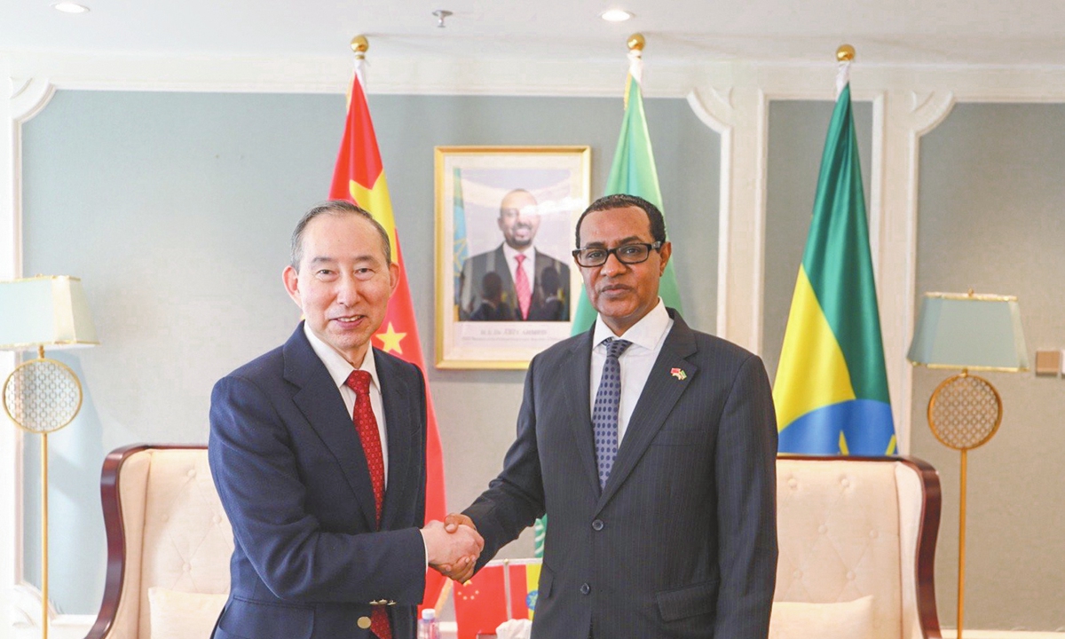 Ethiopian Ambassador to China, Tefera Derbew (right) and Long Yuxiang pose for a photo in Beijing on October 29, 2024. Photo: Courtesy of the Ethiopian Embassy in China