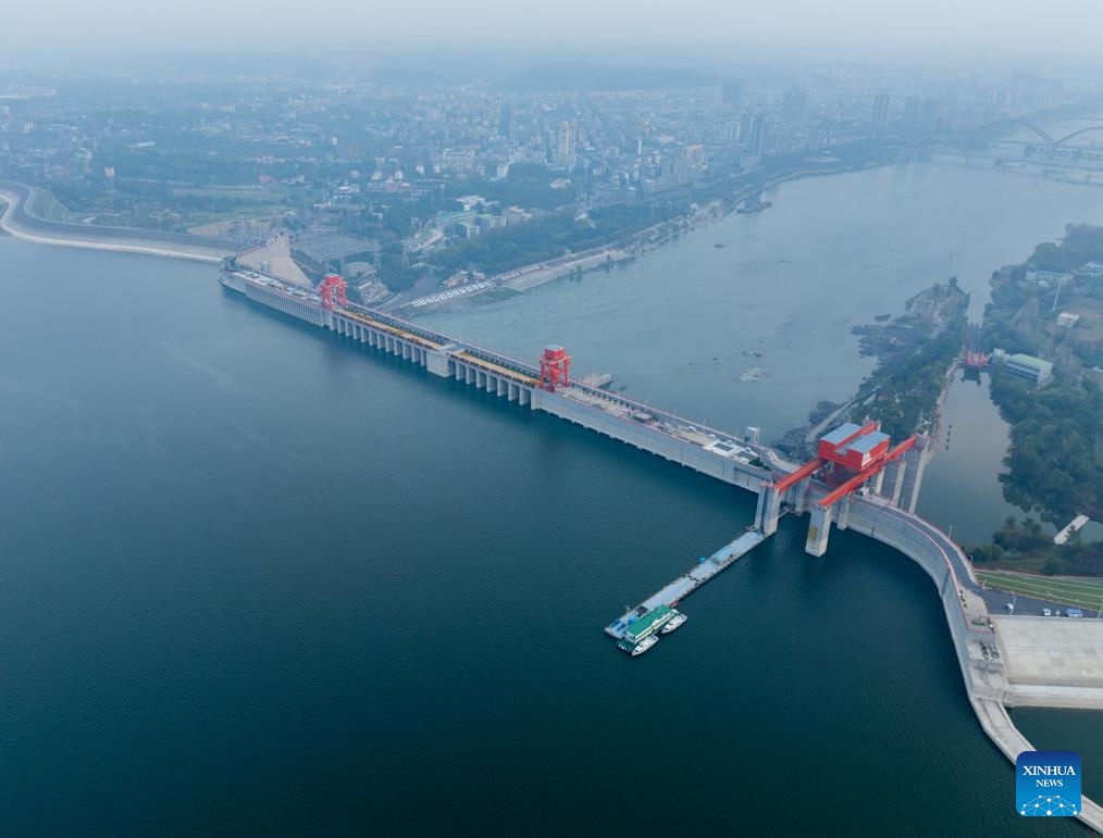 An aerial drone photo taken on Oct. 29, 2024 shows the Danjiangkou Reservoir in central China's Hubei Province. China's South-to-North Water Diversion Project has three routes. The middle route, the most prominent of the three as it feeds water to the nation's capital, starts at the Danjiangkou Reservoir and runs across the Henan and Hebei provinces before reaching Beijing and Tianjin. It began supplying water in December 2014. (Photo: Xinhua)