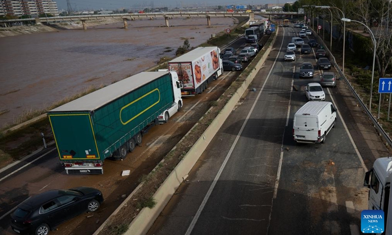 This photo shows a view of the flood-hit area in Valencia, Spain, Oct. 30, 2024. At least 95 people have been killed in flooding as torrential rain battered Spain's eastern region of Valencia and the neighboring provinces of Albacete and Cuenca, according to Angel Victor Torres, Minister for Territorial Policy and Democratic Memory. The Spanish government declared three days of official mourning on Wednesday. (Photo: Xinhua)