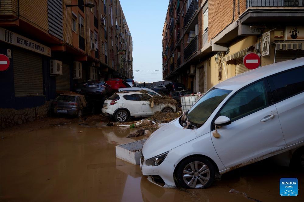 This photo shows a view of the flood-hit area in Valencia, Spain, Oct. 30, 2024. At least 95 people have been killed in flooding as torrential rain battered Spain's eastern region of Valencia and the neighboring provinces of Albacete and Cuenca, according to Angel Victor Torres, Minister for Territorial Policy and Democratic Memory. The Spanish government declared three days of official mourning on Wednesday. (Photo: Xinhua)