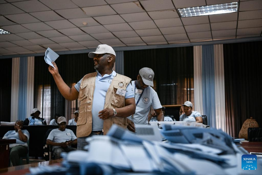 Staff members count ballots at a polling station in Tlokweng, South-East district, Botswana, Oct. 31, 2024. Botswana nationals on Wednesday headed to polling stations to cast their ballots for new parliamentarians and local authorities. According to the southern African country's electoral law, the polling will determine 61 members of the National Assembly and 609 local councilors, with the party that holds at least 31 parliament seats to be declared as the winner. (Photo: Xinhua)