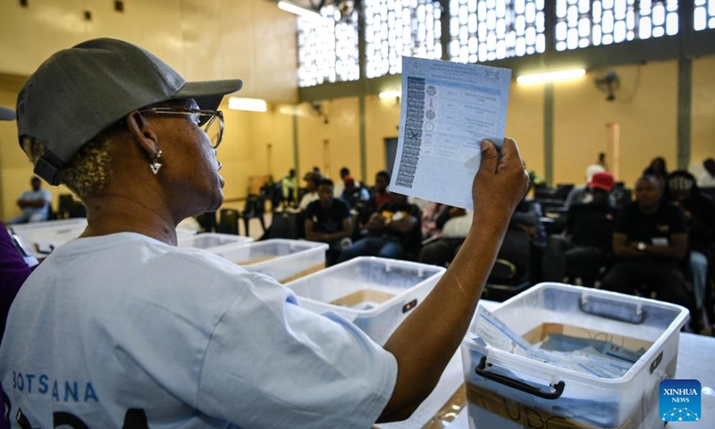 A staff member counts ballots at a polling station in Gaborone, Botswana, Oct. 31, 2024. Botswana nationals on Wednesday headed to polling stations to cast their ballots for new parliamentarians and local authorities. According to the southern African country's electoral law, the polling will determine 61 members of the National Assembly and 609 local councilors, with the party that holds at least 31 parliament seats to be declared as the winner. (Photo: Xinhua)