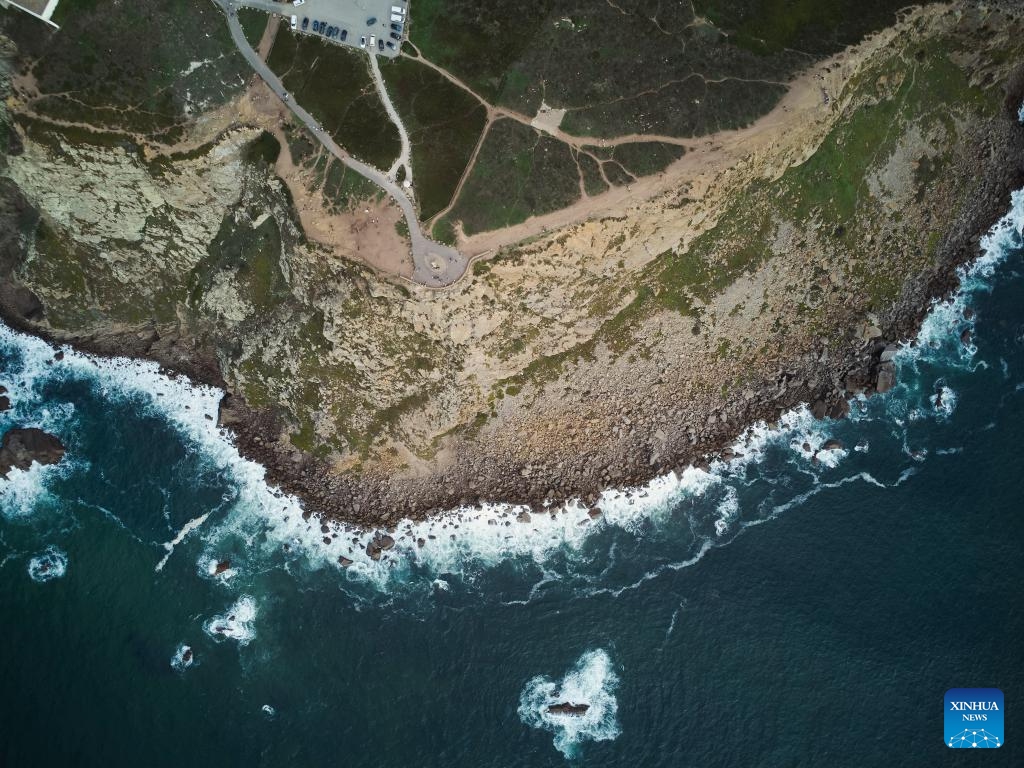 An aerial drone photo taken on Oct. 30, 2024 shows a view of the Cabo da Roca in Portugal. The Cabo da Roca (Cape Roca) is the westernmost point of both Portugal and the mainland Europe. Luis Vaz de Camoes, a Portuguese poet, once described the cape as where the land ends and the sea begins. (Photo: Xinhua)