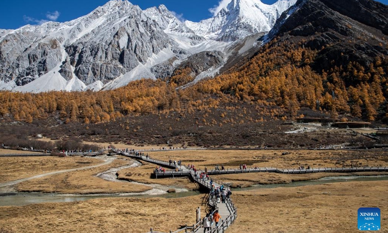 Tourists visit the Yading scenic spot in Daocheng County of Tibetan Autonomous Prefecture of Garze, southwest China's Sichuan Province, Oct. 31, 2024. (Photo: Xinhua)