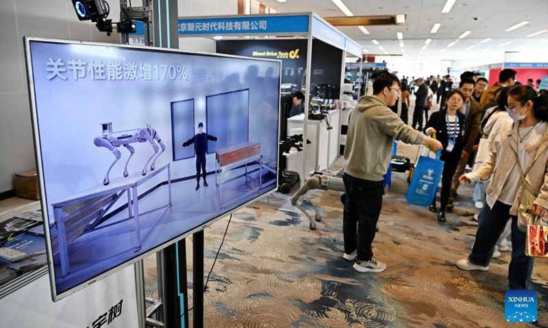 Participants visit the exhibition area of the 2024 China Automation Congress in Qingdao, east China's Shandong Province, Nov. 2, 2024. The 2024 China Automation Congress, which focuses on the deep integration of automation and artificial intelligence as well as explores the innovative development of new industries and technologies, would last from Nov. 1 to Nov. 3 here. (Photo: Xinhua)