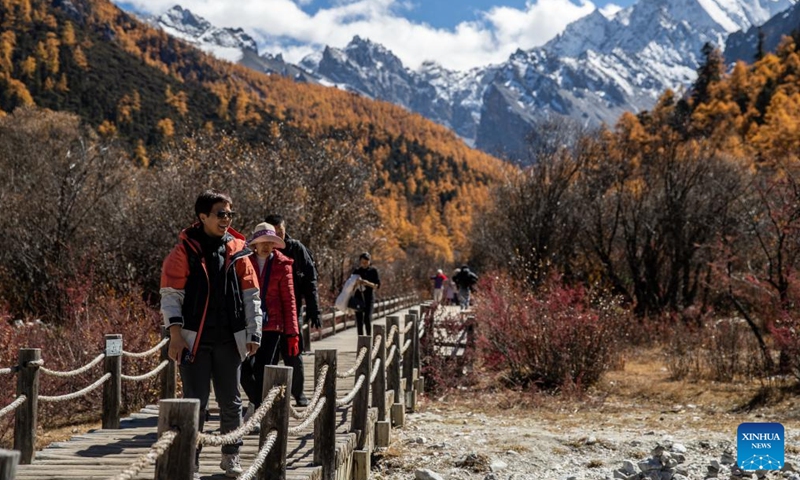 Tourists visit the Yading scenic spot in Daocheng County of Tibetan Autonomous Prefecture of Garze, southwest China's Sichuan Province, Oct. 31, 2024. (Photo: Xinhua)