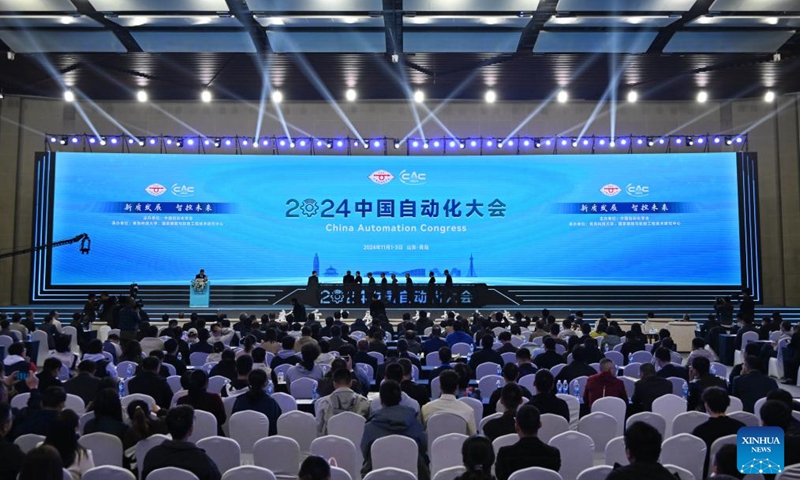 Participants attend the 2024 China Automation Congress in Qingdao, east China's Shandong Province, Nov. 2, 2024. The 2024 China Automation Congress, which focuses on the deep integration of automation and artificial intelligence as well as explores the innovative development of new industries and technologies, would last from Nov. 1 to Nov. 3 here. (Photo: Xinhua)