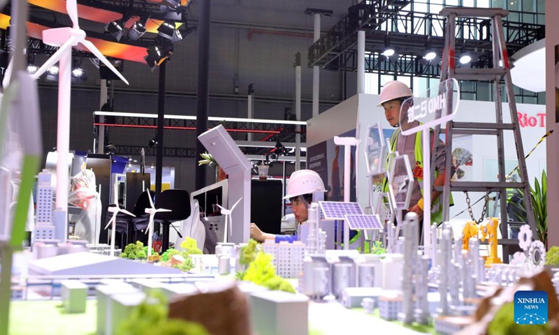 Workers set up exhibition booths for the upcoming 7th China International Import Expo (CIIE) at the National Exhibition and Convention Center (Shanghai), the main venue for the CIIE, in east China's Shanghai, Nov. 2, 2024. Preparations for the 7th CIIE, which is scheduled to take place in Shanghai from Nov. 5 to 10, have entered the final stage. (Photo: Xinhua)